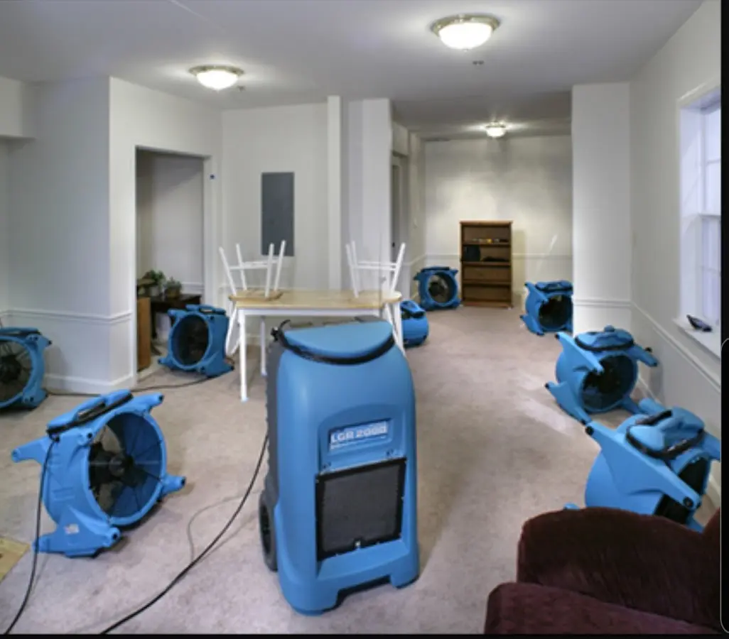 Air movers and dehumidifier setup for Water Extraction & Removal in Winterset
